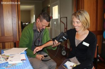 Julian Waller (SCDHB Stroke Services) checks Tania Metherell's blood pressure